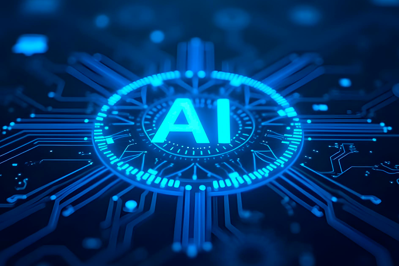 Iniciales de Artificial Intellingence sobre un sensor color azul 